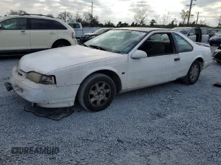 1994 Ford Thunderbird LX with VIN 1FALP62W6RH206764, listed as a Copart auction lot 44213965 with 105,353 mi miles and Salvage Title. Bid and sale history available at DreamBid. Image 1.