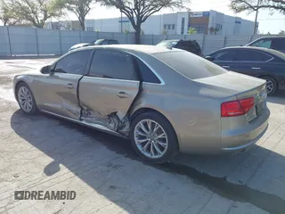 2012 Audi A8 z VIN WAURVAFD3CN024063, wystawiony jako IAAI lot #41706508 z przebiegiem Nie podano mil oraz . Historia ofert i sprzedaży dostępna na DreamBid. Obrazek 3.