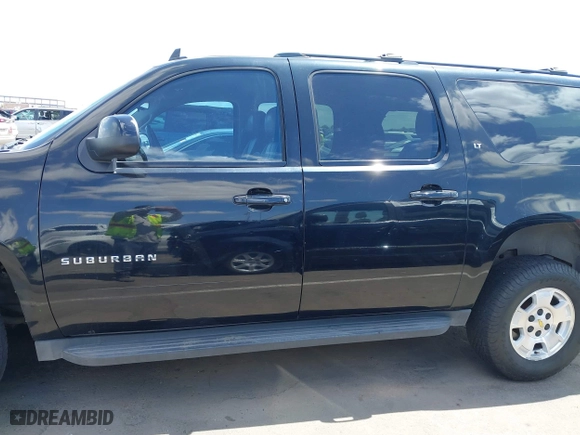 2012 Chevrolet Suburban LT with VIN 1GNSCJE00CR226285, listed as a IAAI auction lot 42059936 with 318,948 mi miles. Bid and sale history available at carsss.com. Image 14.