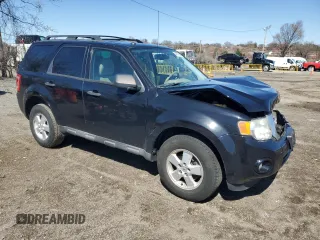 2010 Ford Escape XLT с VIN 1FMCU0D79AKC14494, выставлен на аукционе Copart как лот 49918205 с пробегом 143 009 миль миль и Списание • Salvage title. История ставок и продаж доступна на DreamBid. Изображение 4.