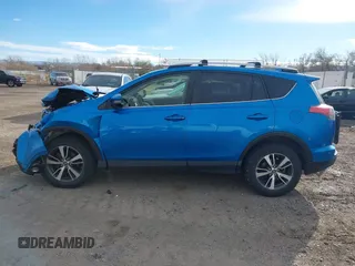 2016 Toyota RAV4 XLE with VIN JTMRFREV4GD186580, listed as a IAAI auction lot 40916703 with 117,120 mi miles and . Bid and sale history available at DreamBid. Image 14.