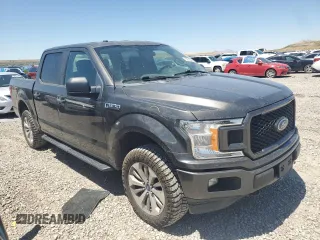 2018 Ford F-150 XL with VIN 1FTEW1EPXJKE71093, listed as a Copart auction lot 63812265 with 122,361 mi miles and Salvage title. Bid and sale history available at DreamBid. Image 4.