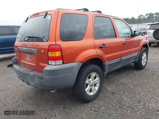 2007 Ford Escape XLT with VIN 1FMYU93177KA38867, listed as a IAAI auction lot 41652994 with 136,730 mi miles. Bid and sale history available at carsss.com. Image 4.
