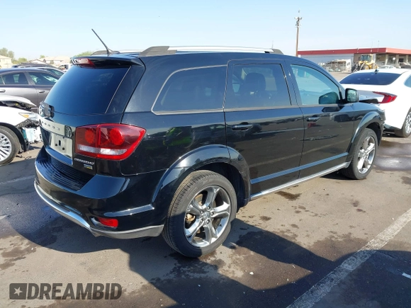 2017 Dodge Journey Crossroad Plus z VIN 3C4PDCGG9HT554093, wystawiony jako IAAI lot #42368687 z przebiegiem 112 759 mil mil oraz . Historia ofert i sprzedaży dostępna na DreamBid. Obrazek 4.