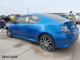2014 Scion tC with VIN JTKJF5C77E3081277, listed as a IAAI auction lot 41932581 with 135,556 mi miles. Bid and sale history available at carsss.com. Image 15.