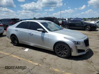 2015 Cadillac CTS Luxury AWD with VIN 1G6AX5SX7F0125323, listed as a Copart auction lot 62887835 with 87,437 mi miles and Clean title. Bid and sale history available at DreamBid. Image 4.
