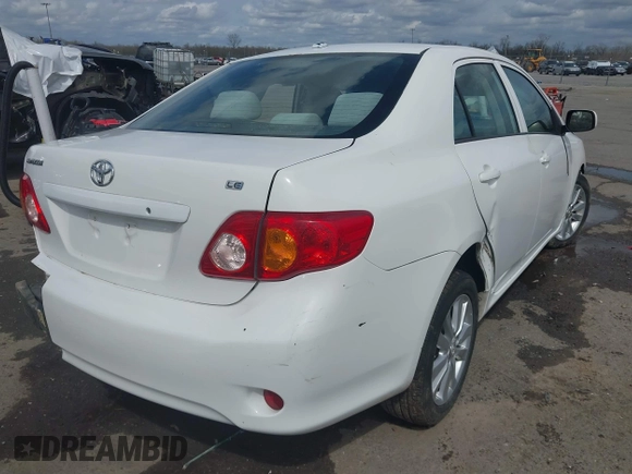 2009 Toyota Corolla with VIN 1NXBU40E59Z023792, listed as a IAAI auction lot 41743473 with 128,454 mi miles. Bid and sale history available at carsss.com. Image 4.