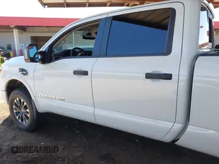 2019 Nissan Titan Pro-4X with VIN 1N6BA1F45KN533051, listed as a IAAI auction lot 42587343 with 134,768 mi miles and . Bid and sale history available at DreamBid. Image 14.
