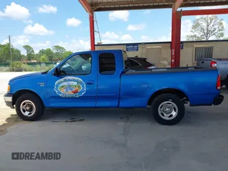 1999 Ford F-150 XL with VIN 1FTRX17L9XNB83680, listed as a IAAI auction lot 42636807 with Not provided miles and . Bid and sale history available at DreamBid. Image 14.