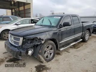 2008 Dodge Dakota Laramie with VIN 1D7HW58N48S633105, listed as a Copart auction lot 36826944 with 141,456 mi miles and Salvage Title. Bid and sale history available at carsss.com. Image 1.