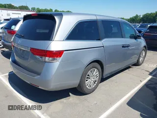 2016 Honda Odyssey LX z VIN 5FNRL5H22GB092614, wystawiony jako IAAI lot #42173633 z przebiegiem 159 387 mil mil oraz . Historia ofert i sprzedaży dostępna na DreamBid. Obrazek 4.
