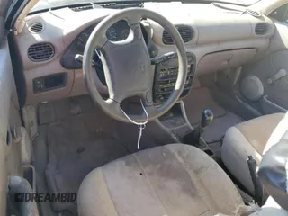 1999 Hyundai Accent z VIN KMHVD14N4XU456698, wystawiony jako Copart lot #41733345 z przebiegiem 197 574 mil mil oraz Szkody całkowita. Historia ofert i sprzedaży dostępna na DreamBid. Obrazek 8.