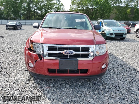2012 Ford Escape XLT z VIN 1FMCU9D78CKC48403, wystawiony jako Copart lot #59278185 z przebiegiem 83 487 mil mil oraz Czysty tytuł • Clean title. Historia ofert i sprzedaży dostępna na DreamBid. Obrazek 5.