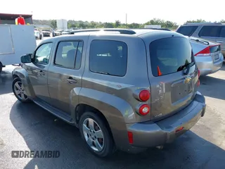 2011 Chevrolet HHR LS z VIN 3GNBAAFW9BS607895, wystawiony jako IAAI lot #42029086 z przebiegiem 98 149 mil mil oraz . Historia ofert i sprzedaży dostępna na DreamBid. Obrazek 3.