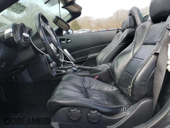 2006 Nissan 350Z Touring z VIN JN1AZ36A76M450924, wystawiony jako Copart lot #47313125 z przebiegiem 107 621 mil mil oraz Szkoda całkowita • Salvage title. Historia ofert i sprzedaży dostępna na DreamBid. Obrazek 7.