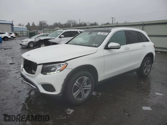 2019 Mercedes-Benz GLC with VIN WDC0G4KB4KV131837, listed as a Copart auction lot 70310052 with 64,571 mi miles. Bid and sale history available at carsss.com. Image 1.