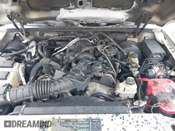 2004 Ford Explorer Sport Trac XLS z VIN 1FMDU77K74UA77223, wystawiony jako IAAI lot #42167996 z przebiegiem Nie podano mil oraz . Historia ofert i sprzedaży dostępna na DreamBid. Obrazek 10.
