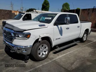 2020 Ram 1500 Laramie with VIN 1C6SRFJM6LN208434, listed as a Copart auction lot 58059085 with 64,786 mi miles and Salvage title. Bid and sale history available at DreamBid. Image 1.