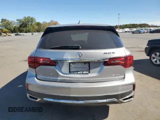 2018 Acura MDX with VIN 5J8YD4H33JL019169, listed as a Copart auction lot 75178824 with 68,676 mi miles and Salvage title. Bid and sale history available at DreamBid. Image 6.