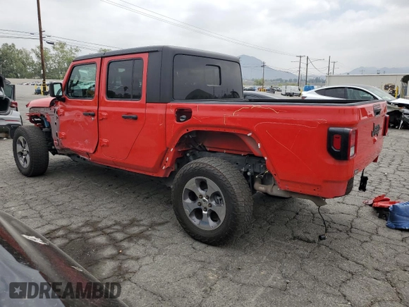 2023 Jeep Gladiator Sport S with VIN 1C6HJTAG4PL547608, listed as a Copart auction lot 52566245 with 8,464 mi miles and Salvage title. Bid and sale history available at DreamBid. Image 2.