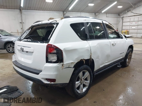 2014 Jeep Compass Sport with VIN 1C4NJDBB3ED773960, listed as a IAAI auction lot 41989986 with 126,875 mi miles. Bid and sale history available at carsss.com. Image 4.