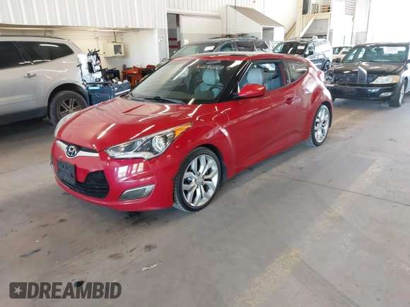 2012 Hyundai Veloster w/Gray Int z VIN KMHTC6AD3CU023998, wystawiony jako IAAI lot #42186875 z przebiegiem 170 771 mil mil oraz . Historia ofert i sprzedaży dostępna na DreamBid. Obrazek 2.