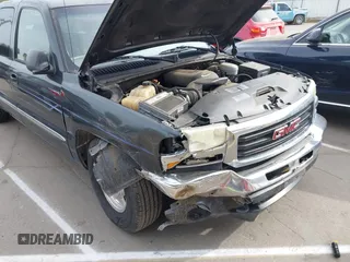 2003 GMC Sierra 1500 SLT with VIN 2GTEC19TX31404836, listed as a IAAI auction lot 42011067 with 233,458 mi miles and . Bid and sale history available at carsss.com. Image 6.