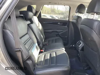 2018 Kia Sorento SX Limited z VIN 5XYPKDA57JG377866, wystawiony jako Copart lot #84375944 z przebiegiem Nie podano mil oraz Szkoda całkowita • Salvage title. Historia ofert i sprzedaży dostępna na DreamBid. Obrazek 11.