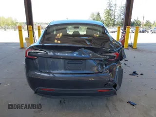2025 Tesla Model 3 Long Range with VIN 5YJ3E1EA1SF923548, listed as a IAAI auction lot 42046257 with 3,979 mi miles and . Bid and sale history available at carsss.com. Image 16.