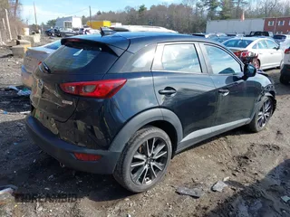2017 Mazda CX-3 Touring with VIN JM1DKFC70H0171771, listed as a IAAI auction lot 41870395 with 100,472 mi miles. Bid and sale history available at carsss.com. Image 4.