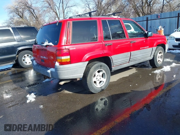 1996 Jeep Grand Cherokee Laredo with VIN 1J4GZ58Y8TC374929, listed as a IAAI auction lot 41725111 with 196,723 mi miles. Bid and sale history available at carsss.com. Image 4.