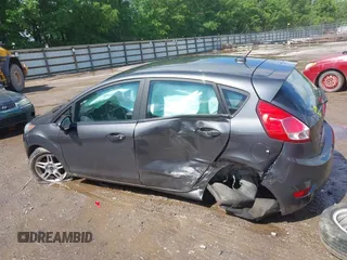 2019 Ford Fiesta SE z VIN 3FADP4EJ9KM125252, wystawiony jako IAAI lot #42221622 z przebiegiem 57 366 mil mil oraz . Historia ofert i sprzedaży dostępna na DreamBid. Obrazek 15.