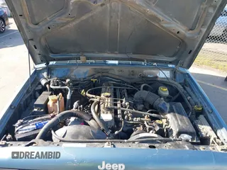 1998 Jeep Cherokee Sport with VIN 1J4FT68S0WL231959, listed as a IAAI auction lot 41680076 with 252,369 mi miles. Bid and sale history available at carsss.com. Image 10.