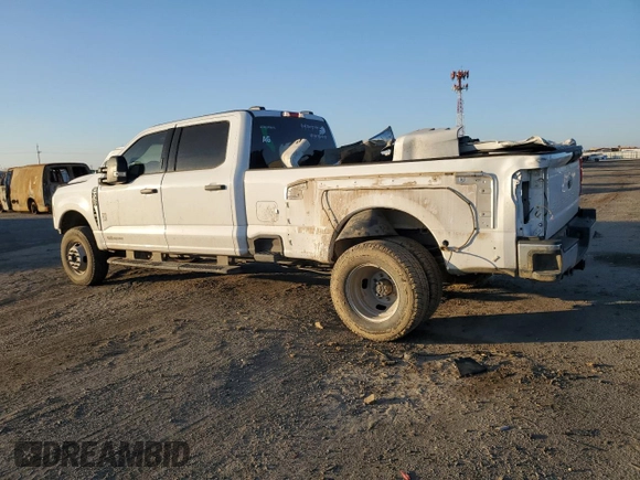 2024 Ford F-350 XL with VIN 1FT8W3DT5REC30446, listed as a Copart auction lot 88304145 with 23,260 mi miles and Salvage Title. Bid and sale history available at DreamBid. Image 2.