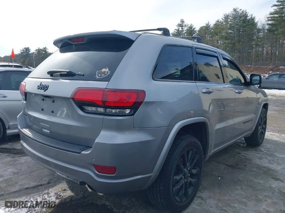 2018 Jeep Grand Cherokee Laredo E with VIN 1C4RJFAG1JC487082, listed as a IAAI auction lot 41663081 with 136,853 mi miles. Bid and sale history available at carsss.com. Image 4.