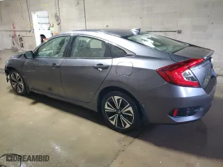 2018 Honda Civic Sedan EX-T with VIN JHMFC1F32JX027569, listed as a Copart auction lot 50447525 with 35,219 mi miles and Salvage Title. Bid and sale history available at carsss.com. Image 2.