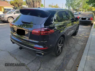 2016 Porsche Cayenne with VIN WP1AA2A26GLA10262, listed as a Copart auction lot 54455435 with 145,692 mi miles and Clean Title. Bid and sale history available at carsss.com. Image 4.