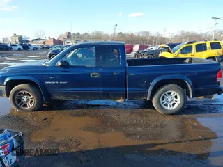 2002 Dodge Dakota Sport with VIN 1B7GL32X52S569340, listed as a IAAI auction lot 41541480 with 176,632 mi miles. Bid and sale history available at carsss.com. Image 14.