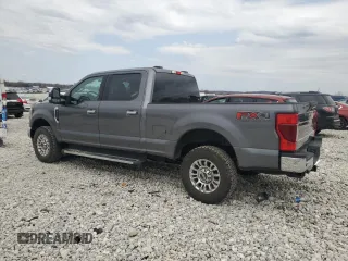 2021 Ford Super Duty F-250 SRW XL with VIN 1FT7W2B63MED45073, listed as a Copart auction lot 49777495 with 99,890 mi miles and Salvage Title. Bid and sale history available at carsss.com. Image 2.