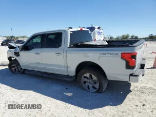 2024 Ford F-150 Lightning Flash z VIN 1FT6W3L70RWG11725, wystawiony jako Copart lot #47840675 z przebiegiem Nie podano mil oraz Szkody całkowita. Historia ofert i sprzedaży dostępna na DreamBid. Obrazek 2.
