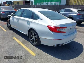 2021 Honda Accord Touring with VIN 1HGCV2F92MA024124, listed as a IAAI auction lot 42353443 with 22,457 mi miles and . Bid and sale history available at DreamBid. Image 3.