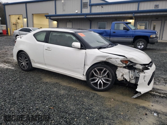 2014 Scion tC z VIN JTKJF5C78E3086696, wystawiony jako Copart lot #84040544 z przebiegiem 83 973 mil mil oraz Szkoda całkowita • Salvage title. Historia ofert i sprzedaży dostępna na DreamBid. Obrazek 4.