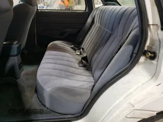 1993 Ford Tempo GL z VIN 2FAPP36X2PB104844, wystawiony jako Copart lot #81046964 z przebiegiem 5951 mil mil oraz Szkody całkowita. Historia ofert i sprzedaży dostępna na DreamBid. Obrazek 11.
