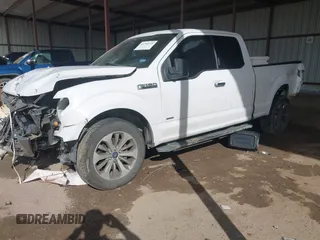 2015 Ford F-150 XL with VIN 1FTEX1CP0FKE84653, listed as a IAAI auction lot 41794451 with 156,552 mi miles. Bid and sale history available at carsss.com. Image 2.