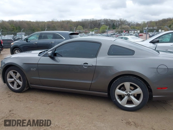 2013 Ford Mustang GT with VIN 1ZVBP8CF1D5261761, listed as a IAAI auction lot 42173607 with 76,658 mi miles and . Bid and sale history available at DreamBid. Image 14.