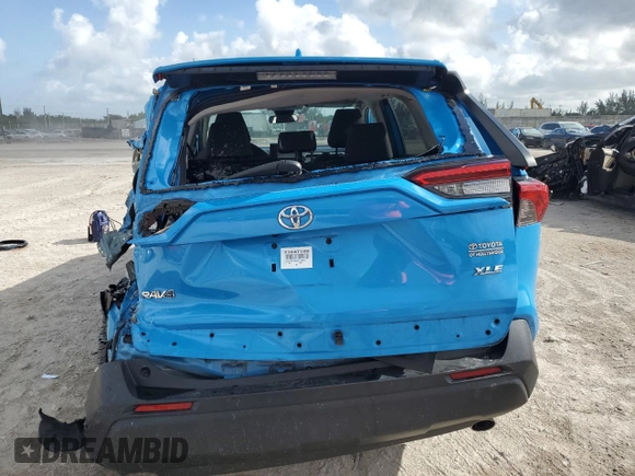 2021 Toyota RAV4 XLE with VIN 2T3W1RFV8MW118944, listed as a Copart auction lot 60824465 with 98,090 mi miles and Salvage title. Bid and sale history available at DreamBid. Image 6.