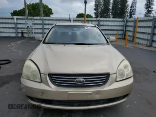 2008 Kia Optima LX z VIN KNAGE124385198719, wystawiony jako Copart lot #55449255 z przebiegiem 156 972 mil mil oraz Szkoda całkowita • Salvage title. Historia ofert i sprzedaży dostępna na DreamBid. Obrazek 5.