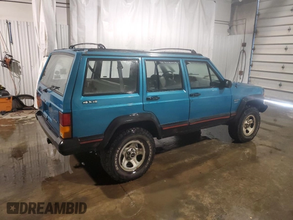 1994 Jeep Cherokee Sport with VIN 1J4FJ68S5RL109124, listed as a Copart auction lot 85524644 with 369,388 mi miles and Salvage title. Bid and sale history available at DreamBid. Image 3.