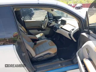 2015 BMW i3 z VIN WBY1Z4C58FV501754, wystawiony jako IAAI lot #42220253 z przebiegiem 59 022 mil mil oraz . Historia ofert i sprzedaży dostępna na DreamBid. Obrazek 5.