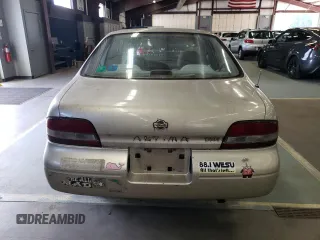 1996 Nissan Altima XE z VIN 1N4BU31D0TC137724, wystawiony jako Copart lot #71544394 z przebiegiem 122 704 mil mil oraz Czysty tytuł • Clean title. Historia ofert i sprzedaży dostępna na DreamBid. Obrazek 6.